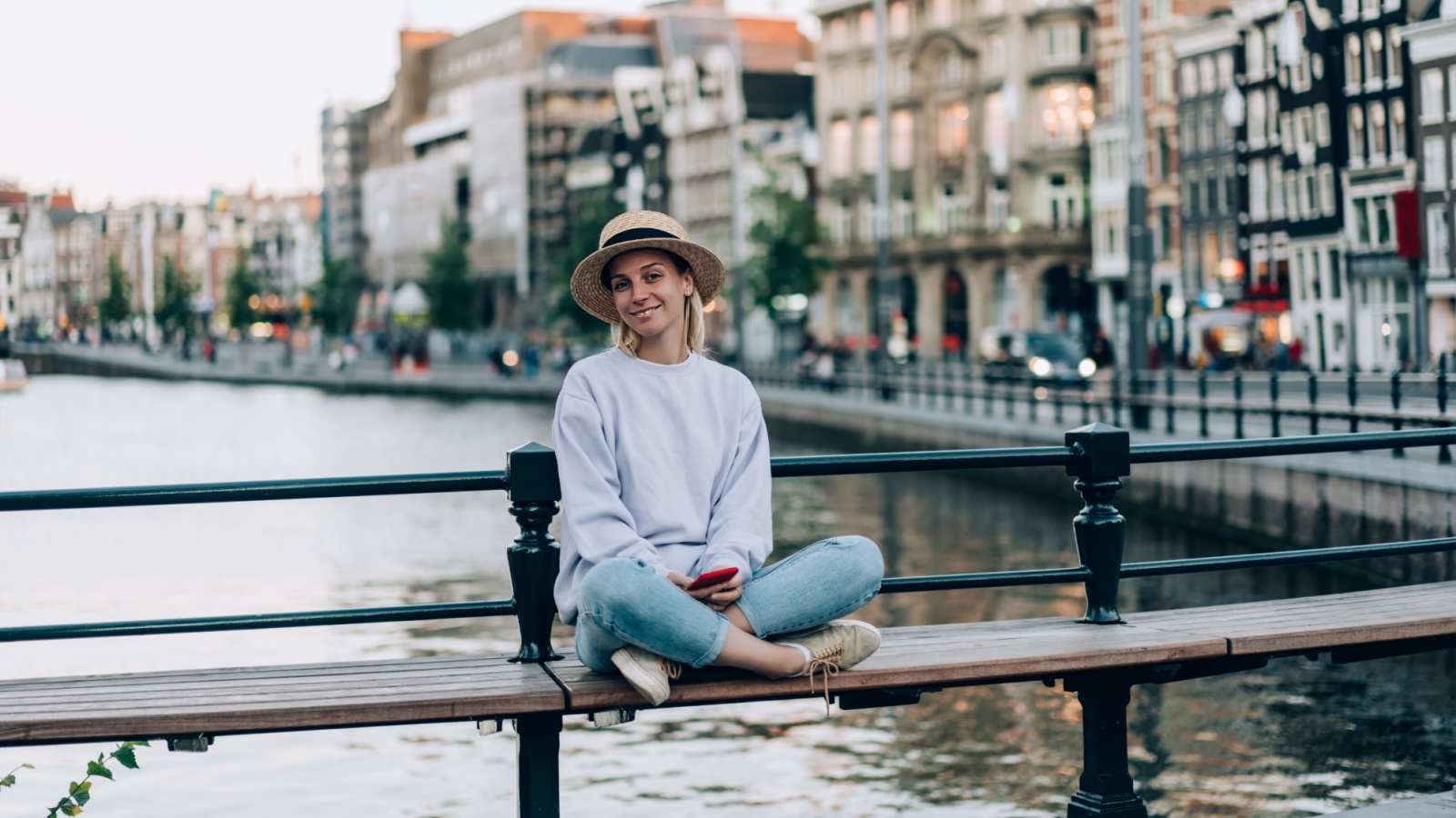 Woman Amsterdam Netherlands travel GaudiLab Shutterstock Woman Amsterdam Netherlands travel GaudiLab Shutterstock