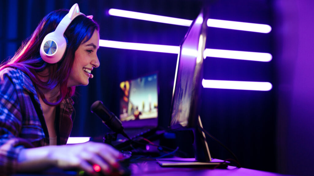 Woman live streaming video game gaming Jacob Lund Shutterstock